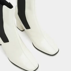 Chelsea Boots en Cuir verni à tige haute écrues - Talon 7 cm-Galeries Lafayette New